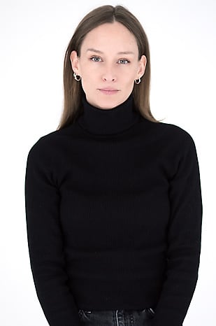 Executive Wearing a Black Turtleneck
