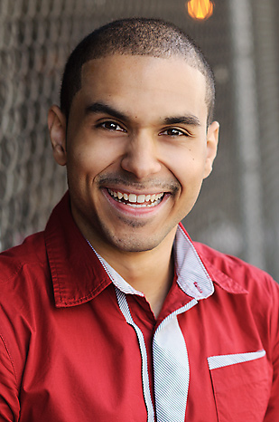 Actor with huge smile and red shirt