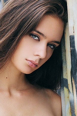 Caty W - model NYC with metal fence