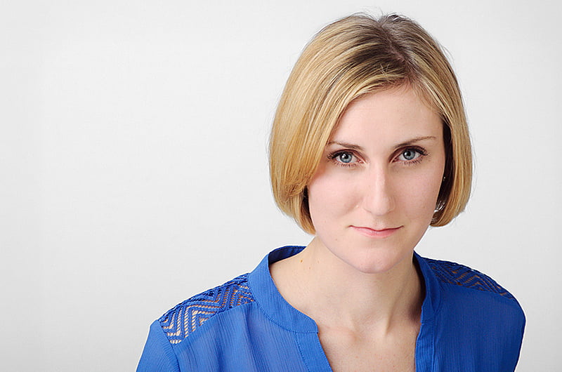Studio Headshot of Alexa M with Black Background